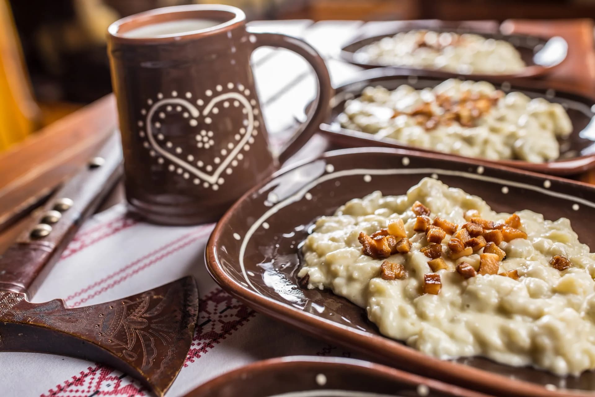 Traditional slovakian food Halusky with fried bacon and decoration
