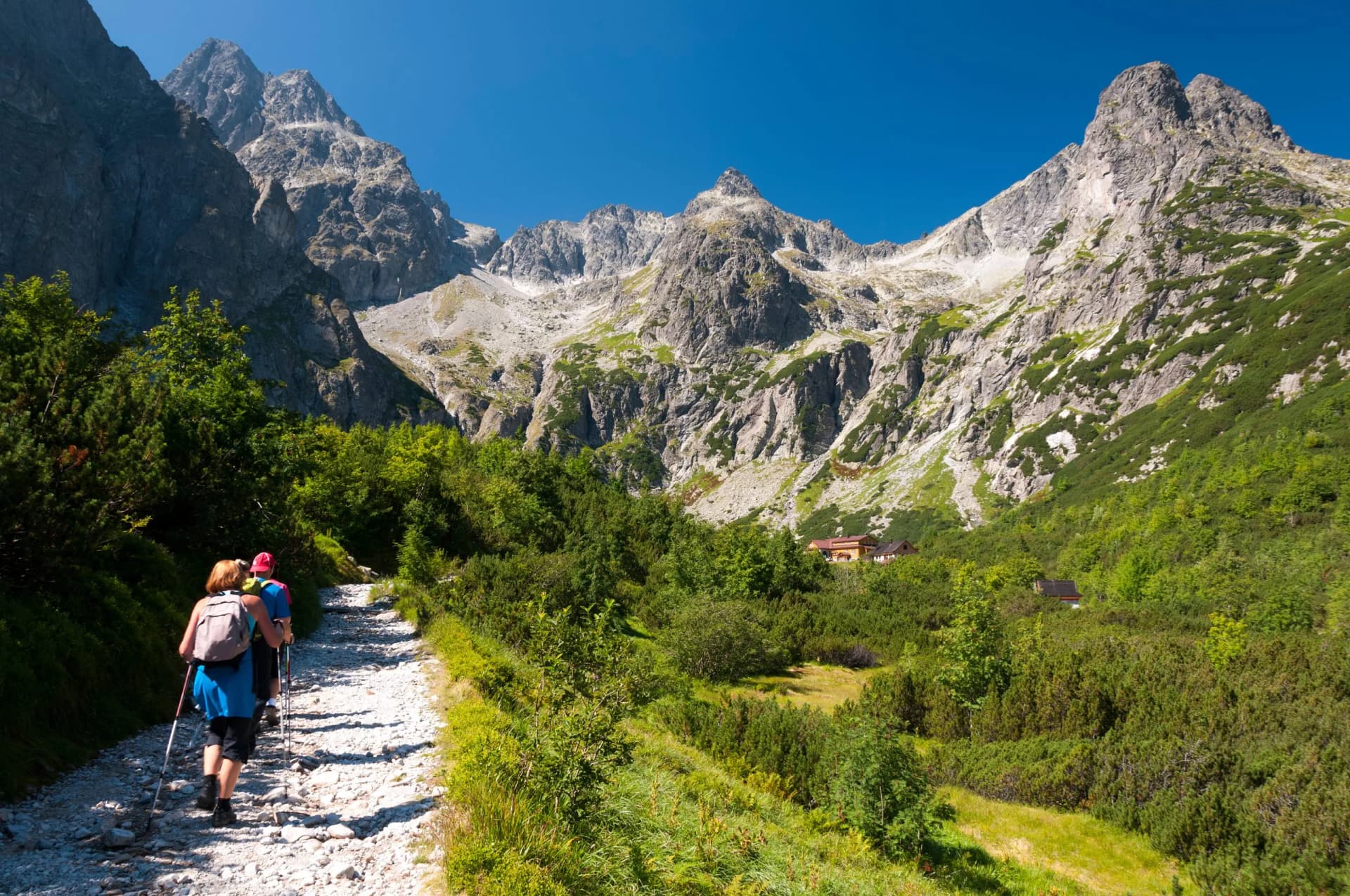 Tourists at chalet at Zelené pleso, High Tatras, Slovakia