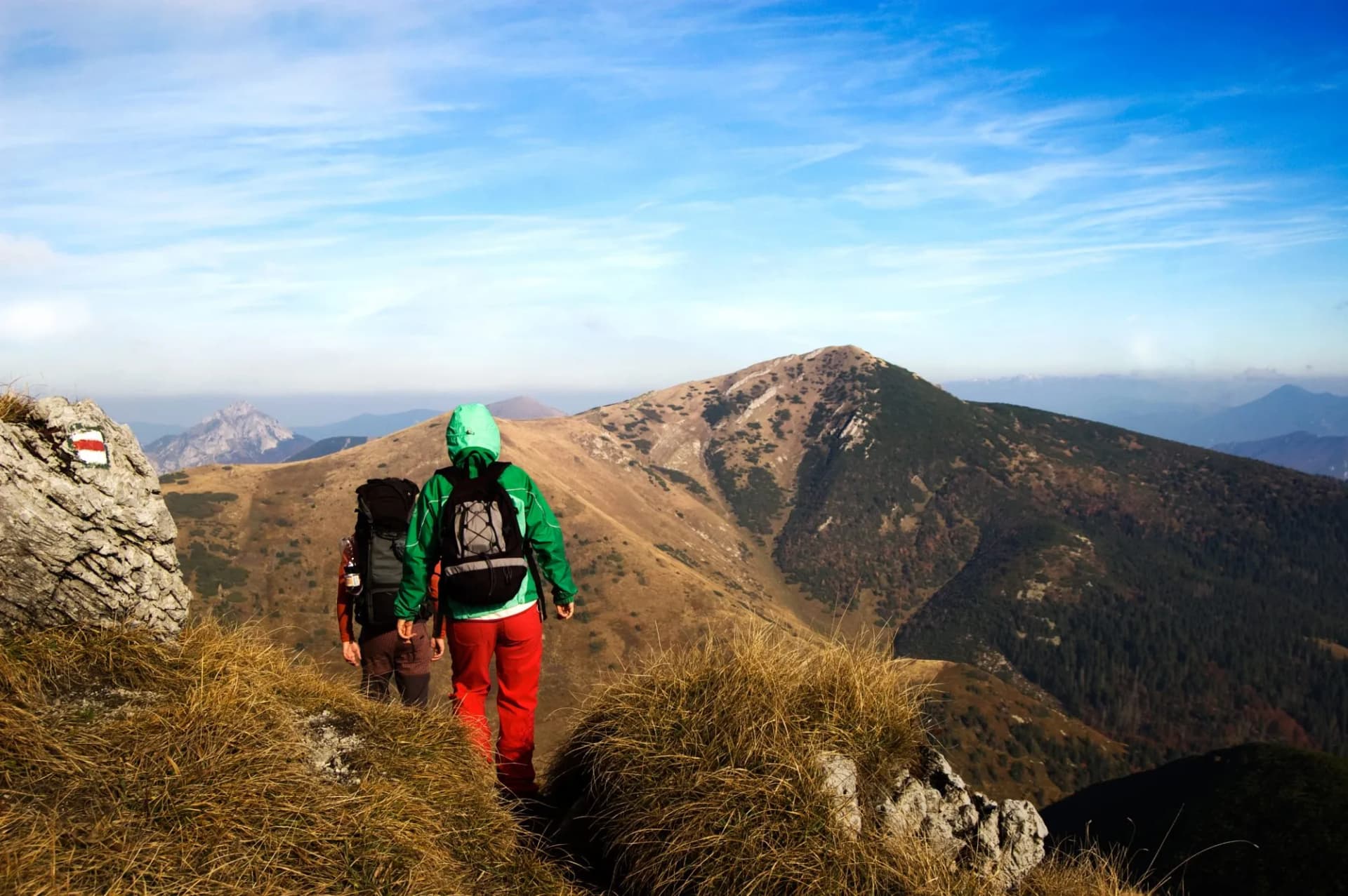 Tourists trekking on Mala Fatra mountains in the autumn
