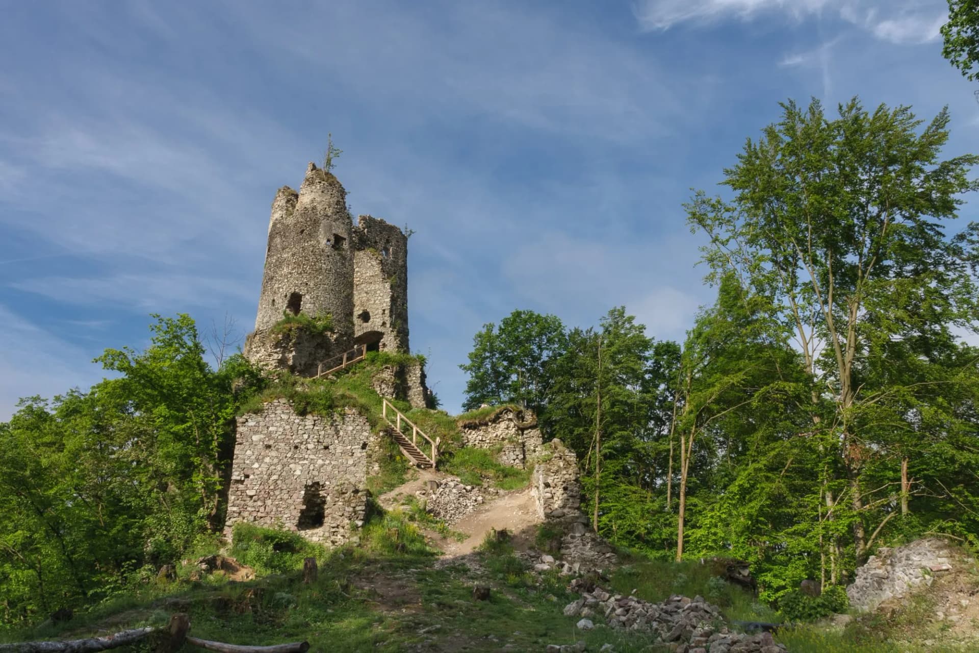 Ruins of medieval castle Starhrad , Slovakia, Mala Fatra, spring day, blue sky with clouds.